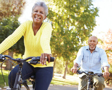 Older Couple Riding Bicycles
